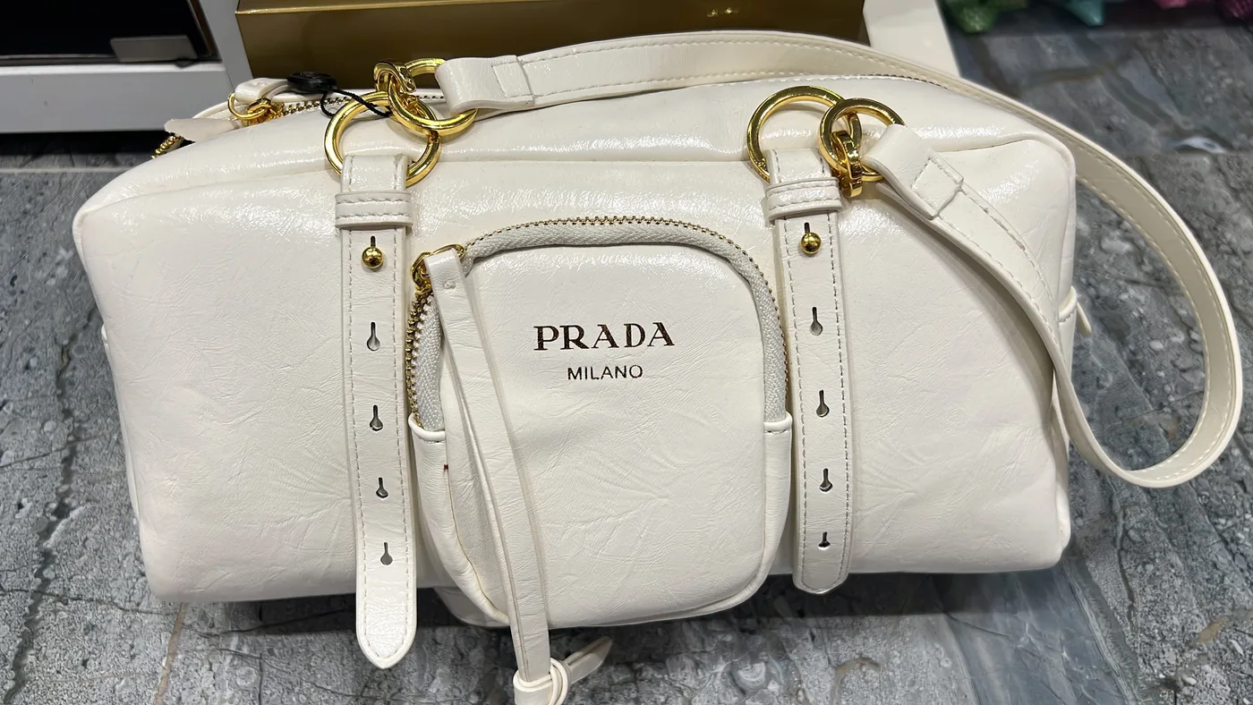 Prada Сумка Prada с ремешками и карманом спереди